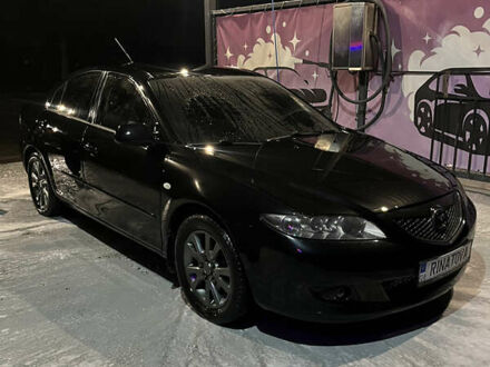 Черный Мазда 6, объемом двигателя 2 л и пробегом 262 тыс. км за 4000 $, фото 1 на Automoto.ua