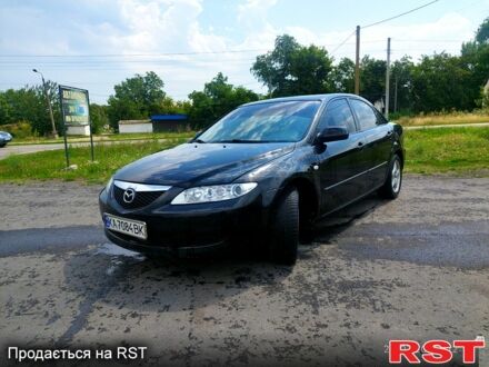 Черный Мазда 6, объемом двигателя 1.8 л и пробегом 346 тыс. км за 3500 $, фото 1 на Automoto.ua