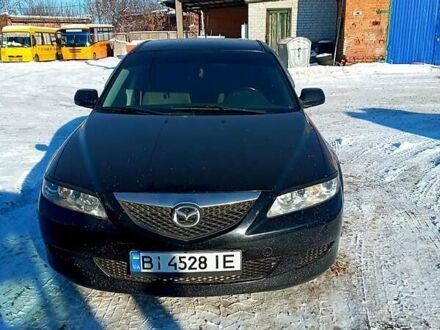 Черный Мазда 6, объемом двигателя 1.8 л и пробегом 210 тыс. км за 4600 $, фото 1 на Automoto.ua