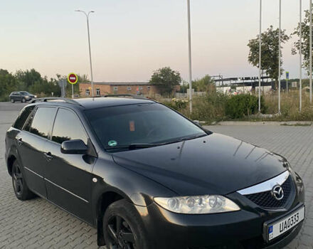 Черный Мазда 6, объемом двигателя 2 л и пробегом 290 тыс. км за 2950 $, фото 1 на Automoto.ua