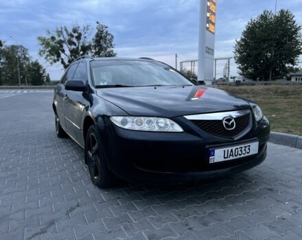 Черный Мазда 6, объемом двигателя 2 л и пробегом 295 тыс. км за 2950 $, фото 1 на Automoto.ua