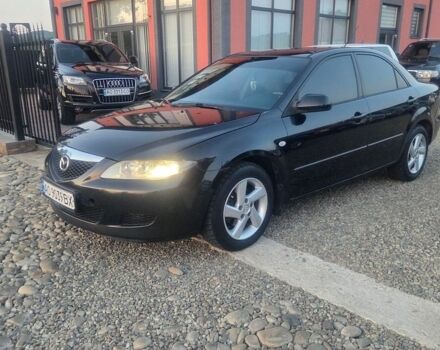Черный Мазда 6, объемом двигателя 2 л и пробегом 304 тыс. км за 2600 $, фото 1 на Automoto.ua