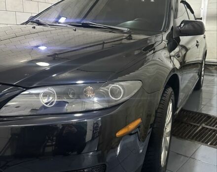 Черный Мазда 6, объемом двигателя 2.3 л и пробегом 355 тыс. км за 5200 $, фото 1 на Automoto.ua