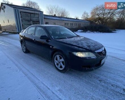 Черный Мазда 6, объемом двигателя 2 л и пробегом 450 тыс. км за 2400 $, фото 1 на Automoto.ua