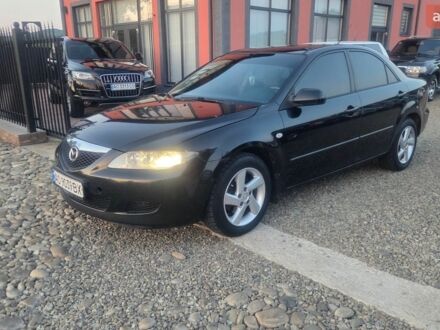 Чорний Мазда 6, об'ємом двигуна 2 л та пробігом 304 тис. км за 2600 $, фото 1 на Automoto.ua
