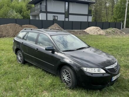 Черный Мазда 6, объемом двигателя 2 л и пробегом 250 тыс. км за 1300 $, фото 1 на Automoto.ua