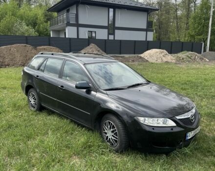 Черный Мазда 6, объемом двигателя 2 л и пробегом 250 тыс. км за 1300 $, фото 1 на Automoto.ua