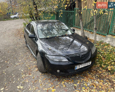 Черный Мазда 6, объемом двигателя 1.8 л и пробегом 350 тыс. км за 1550 $, фото 1 на Automoto.ua