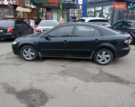Черный Мазда 6, объемом двигателя 2 л и пробегом 330 тыс. км за 3500 $, фото 1 на Automoto.ua