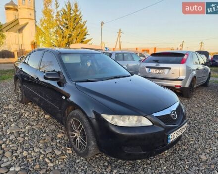 Черный Мазда 6, объемом двигателя 2 л и пробегом 249 тыс. км за 2400 $, фото 1 на Automoto.ua