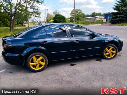 Черный Мазда 6, объемом двигателя 2 л и пробегом 300 тыс. км за 4700 $, фото 1 на Automoto.ua