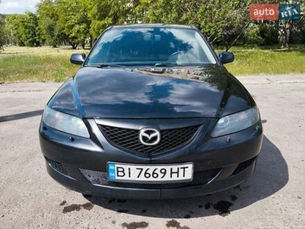 Черный Мазда 6, объемом двигателя 2 л и пробегом 316 тыс. км за 4700 $, фото 1 на Automoto.ua