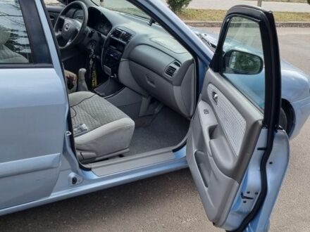 Черный Мазда 6, объемом двигателя 1.6 л и пробегом 150 тыс. км за 1380 $, фото 1 на Automoto.ua