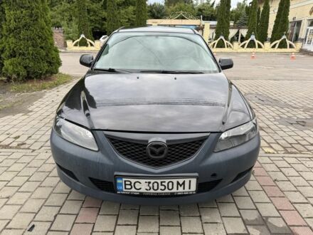 Черный Мазда 6, объемом двигателя 2 л и пробегом 355 тыс. км за 2000 $, фото 1 на Automoto.ua