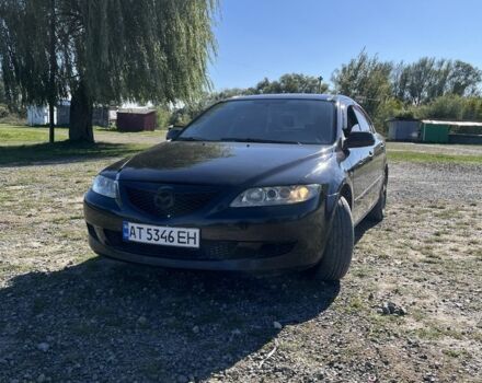 Черный Мазда 6, объемом двигателя 2 л и пробегом 400 тыс. км за 2500 $, фото 1 на Automoto.ua