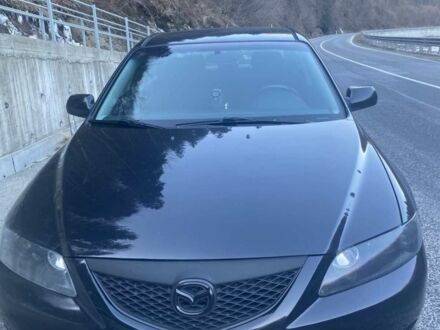Чорний Мазда 6, об'ємом двигуна 2 л та пробігом 250 тис. км за 4800 $, фото 1 на Automoto.ua