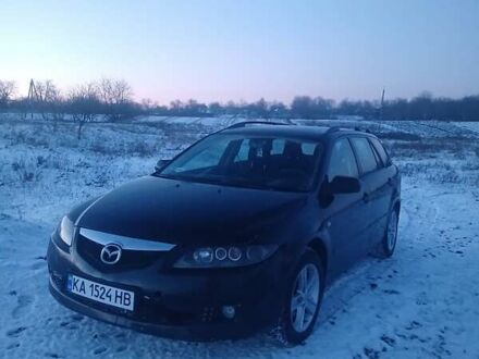 Черный Мазда 6, объемом двигателя 2 л и пробегом 375 тыс. км за 2300 $, фото 1 на Automoto.ua