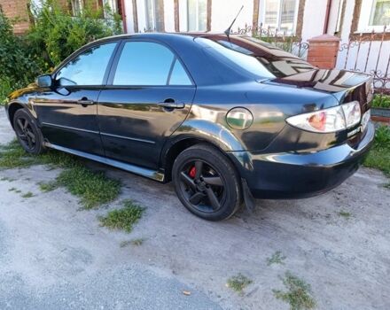Черный Мазда 6, объемом двигателя 2 л и пробегом 350 тыс. км за 2999 $, фото 1 на Automoto.ua