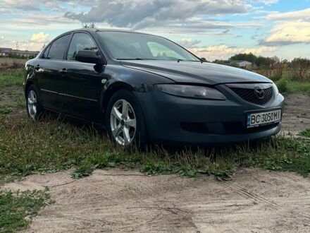 Черный Мазда 6, объемом двигателя 2 л и пробегом 350 тыс. км за 2600 $, фото 1 на Automoto.ua