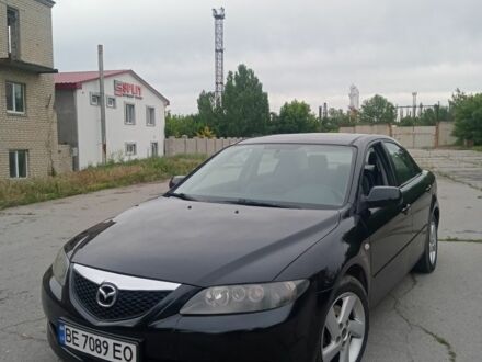 Черный Мазда 6, объемом двигателя 1.8 л и пробегом 291 тыс. км за 3750 $, фото 1 на Automoto.ua