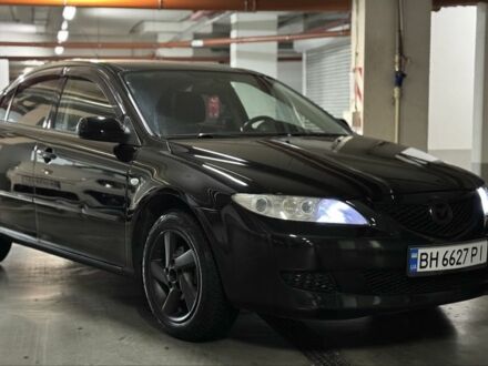 Черный Мазда 6, объемом двигателя 2 л и пробегом 250 тыс. км за 3999 $, фото 1 на Automoto.ua