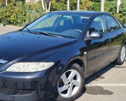 Черный Мазда 6, объемом двигателя 2 л и пробегом 227 тыс. км за 2800 $, фото 1 на Automoto.ua