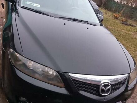 Черный Мазда 6, объемом двигателя 2 л и пробегом 377 тыс. км за 2400 $, фото 1 на Automoto.ua