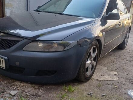 Чорний Мазда 6, об'ємом двигуна 2 л та пробігом 300 тис. км за 1999 $, фото 1 на Automoto.ua