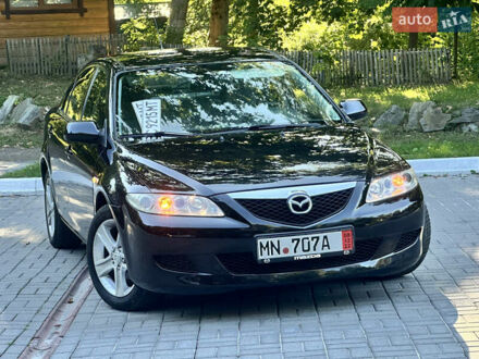 Черный Мазда 6, объемом двигателя 1.8 л и пробегом 230 тыс. км за 3999 $, фото 1 на Automoto.ua
