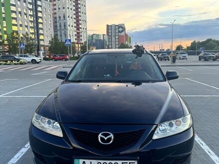 Черный Мазда 6, объемом двигателя 2 л и пробегом 345 тыс. км за 3700 $, фото 1 на Automoto.ua
