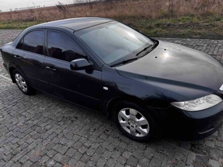 Черный Мазда 6, объемом двигателя 1.8 л и пробегом 250 тыс. км за 2000 $, фото 1 на Automoto.ua