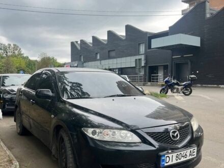 Черный Мазда 6, объемом двигателя 2 л и пробегом 999 тыс. км за 2499 $, фото 1 на Automoto.ua