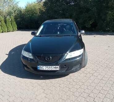 Черный Мазда 6, объемом двигателя 2 л и пробегом 374 тыс. км за 4199 $, фото 1 на Automoto.ua