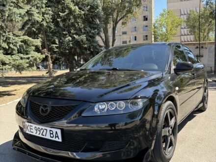 Черный Мазда 6, объемом двигателя 2 л и пробегом 270 тыс. км за 5500 $, фото 1 на Automoto.ua