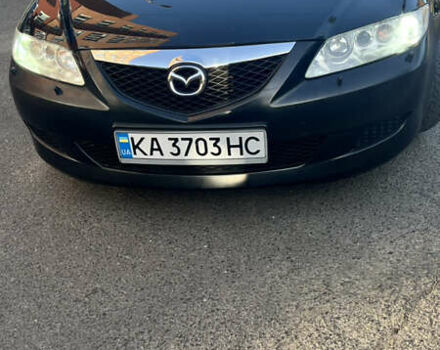 Черный Мазда 6, объемом двигателя 2 л и пробегом 229 тыс. км за 5600 $, фото 1 на Automoto.ua