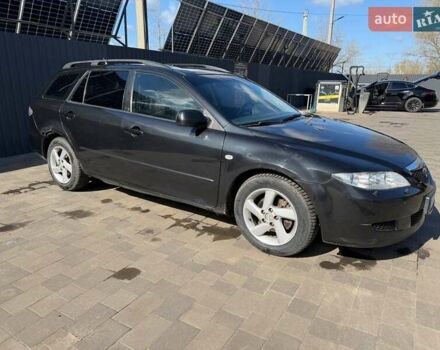 Черный Мазда 6, объемом двигателя 2 л и пробегом 475 тыс. км за 1800 $, фото 1 на Automoto.ua