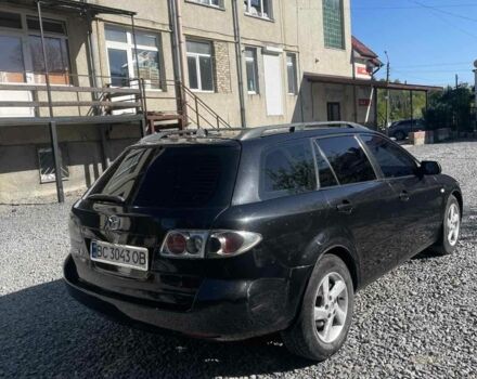 Чорний Мазда 6, об'ємом двигуна 2 л та пробігом 250 тис. км за 2850 $, фото 1 на Automoto.ua