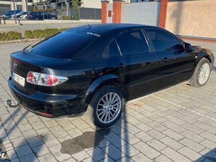 Чорний Мазда 6, об'ємом двигуна 1.8 л та пробігом 260 тис. км за 2999 $, фото 1 на Automoto.ua