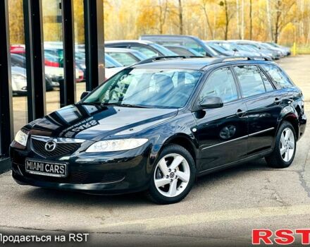 Черный Мазда 6, объемом двигателя 1.8 л и пробегом 299 тыс. км за 3900 $, фото 1 на Automoto.ua