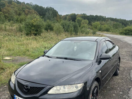 Чорний Мазда 6, об'ємом двигуна 2 л та пробігом 320 тис. км за 1700 $, фото 1 на Automoto.ua