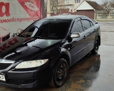 Черный Мазда 6, объемом двигателя 2 л и пробегом 317 тыс. км за 3000 $, фото 1 на Automoto.ua