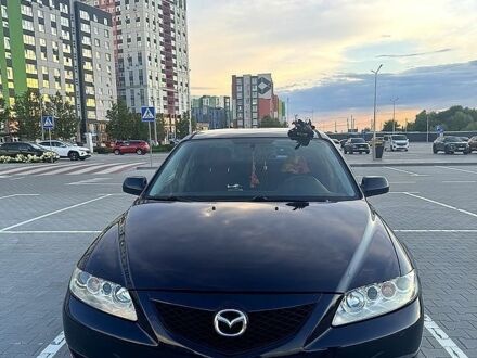 Черный Мазда 6, объемом двигателя 2 л и пробегом 345 тыс. км за 3700 $, фото 1 на Automoto.ua