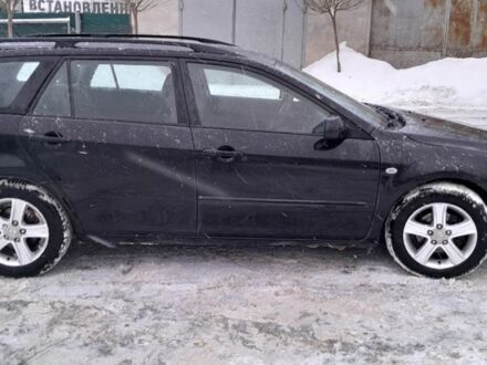 Черный Мазда 6, объемом двигателя 2 л и пробегом 375 тыс. км за 2900 $, фото 1 на Automoto.ua