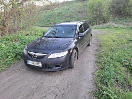 Черный Мазда 6, объемом двигателя 2 л и пробегом 390 тыс. км за 2082 $, фото 1 на Automoto.ua