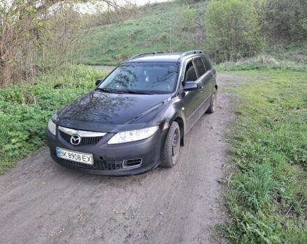 Черный Мазда 6, объемом двигателя 2 л и пробегом 390 тыс. км за 2082 $, фото 1 на Automoto.ua