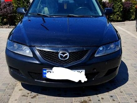 Черный Мазда 6, объемом двигателя 2 л и пробегом 303 тыс. км за 4200 $, фото 1 на Automoto.ua