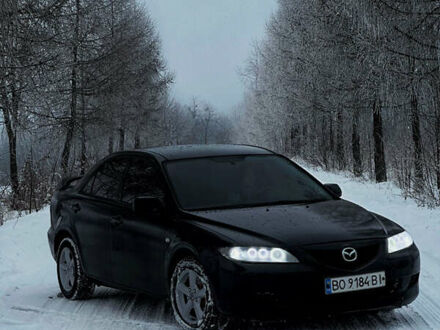 Черный Мазда 6, объемом двигателя 1.8 л и пробегом 267 тыс. км за 3700 $, фото 1 на Automoto.ua