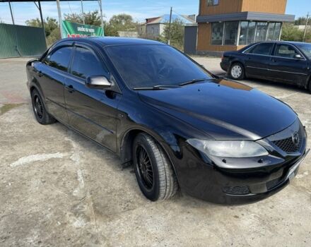 Черный Мазда 6, объемом двигателя 2 л и пробегом 317 тыс. км за 3800 $, фото 1 на Automoto.ua