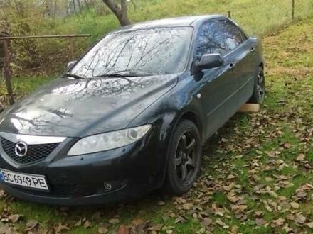 Черный Мазда 6, объемом двигателя 1.8 л и пробегом 350 тыс. км за 2500 $, фото 1 на Automoto.ua