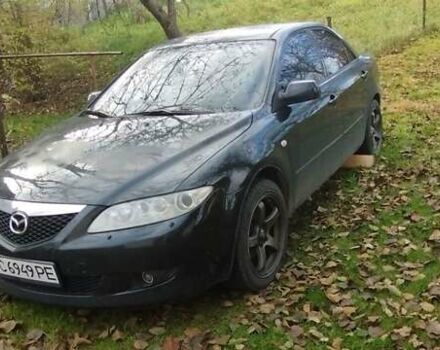 Черный Мазда 6, объемом двигателя 1.8 л и пробегом 350 тыс. км за 2500 $, фото 1 на Automoto.ua